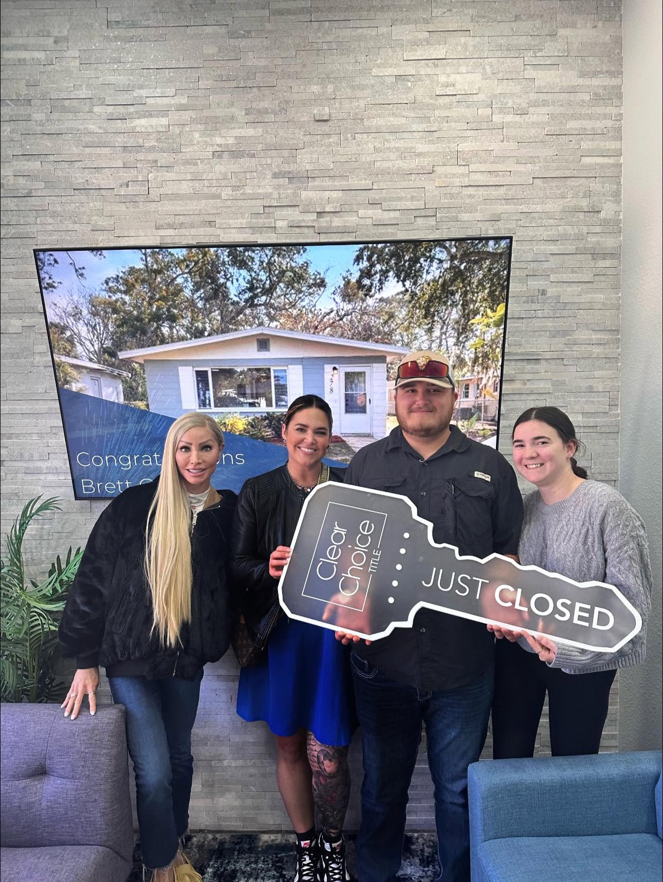 Another client celebrating a home closing with the team
